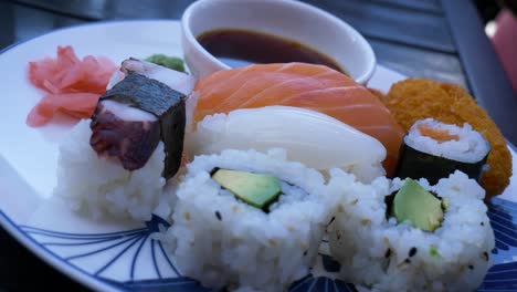Asian-food,-sample,-grabbing-the-sushi-roll