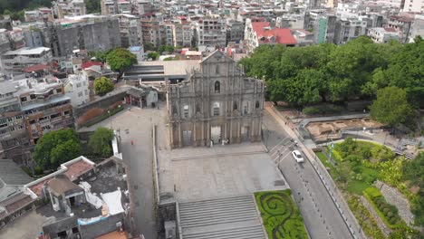 Close-rotating-aerial-view-of-famous-Ruins-of-Saint-Paul's,-Macau