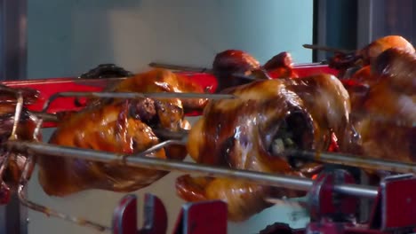 A-typical-Philippine-rotisserie-being-used-for-roasting-marinated-chicken-over-charcoal-on-a-commercial-scale