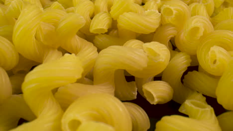 Uncooked-cavatappi-pasta,-close-up