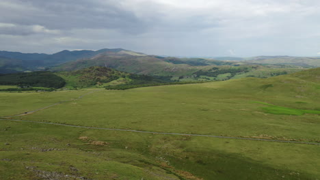 Aerial-dropping-shot-of-the-open-countryside-in-the-Lake-District