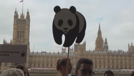 Climate-change-protestors-gather-along-the-Thames-and-outside-Parliament-for-The-Time-is-Now-peaceful-protests