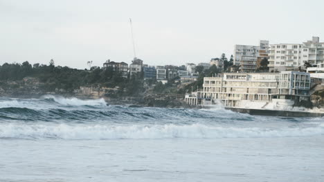 Swimmer-trying-to-brave-the-waves-of-Bondi-beach-Sydney-Australia