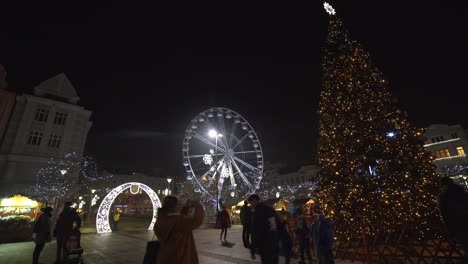 Ostrava-Christmas-Market-with-Russian-wheel,-christmas-tree,-beautiful-lights-and-holiday-decorations