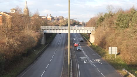 Shot-from-above-of-traffic-driving-on-a-British-dual-carriageway