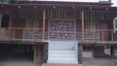 Approaching-ornate-decorated-hut-with-painted-designs