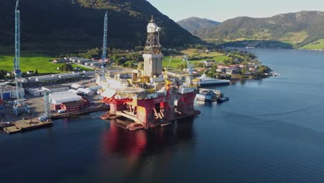 Aerial-approaching-drilling-rig-Transocean-Norge-while-alongside-at-westcon-shipyard-Olensvaag-Norway