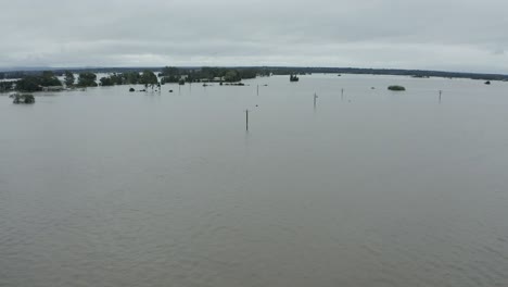 Fully-submerged-street-aerial-view-with-only-the-telegraph-poles-showing-above-the-flood
