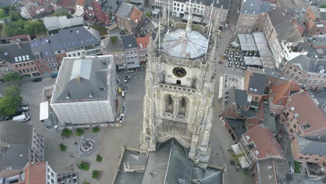 Historic,-gothic-cathedral-Basilica-of-our-lady-Tongeren,-aerial-close-up