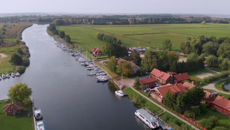 Drone-camera-flaying-over-the-marina-on-a-countryside-at-Minge-village