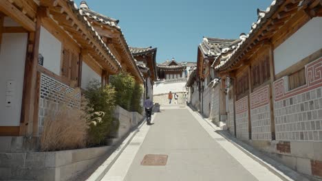 POV-Walking-through-the-Bukchon-ro-11-gil-in-Bukchon-Hanok-Village-in-Seoul,-South-Korea