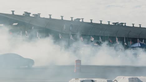 Two-Cars-Drifting-and-Creating-Clouds-of-Burning-Rubber-Tire-Smoke