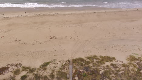 Aerial-tilt-up-view-over-the-Pajaro-Dunes-and-Monterey-Bay-on-the-Pacific-Ocean-California