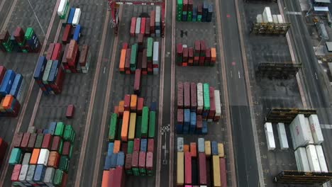 Aerial-View-Of-Stacked-Of-Industrial-Intermodal-Containers-At-Muelle-Sur-del-Callao-In-Lima,-Peru