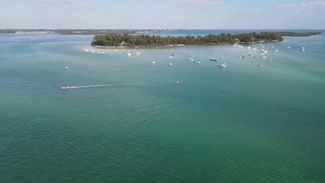 Sarasota,-Florida,-aerial-heading-to-boating-bliss