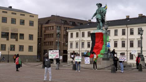 Handheld-shot-Afghanistan-people-on-manifestation-in-central-square,-Gothenburg