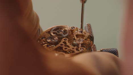 Watchmaker-Unscrew-And-Remove-The-Balance-Wheel-With-Hairspring