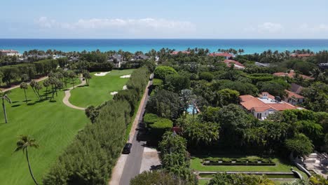 perfectly-manicured-lawns-and-golf-course-of-West-Palm-Beach,-Florida-by-drone