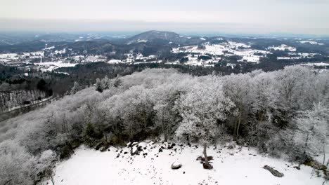 aerial-reveal-of-boone-nc,-north-carolina-with-rime-ice,-hard-rime-and-hoarfrost-on-trees-near-blowing-rock