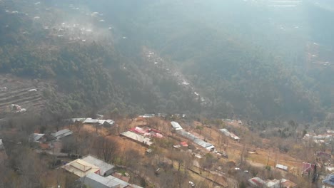 Aerial-View-Of-Misty-Hillside-Landscape-Of-Muzaffarabad-In-Pakistan
