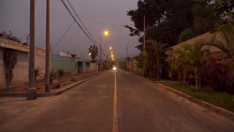 Stabilized-walking-shot-along-an-empty-street-in-El-Sol-de-la-Molina,-Lima,-Peru