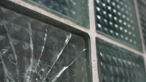 Gun-Shot-Hole-in-Thick-Window,-Vandalising-Concept