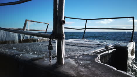 Wide-shot-of-an-ice-covered-concrete-jetty-by-Lake-Ontario
