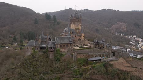 beautiful-close-up-circular-drone-footage-of-the-castle-in-cochem-city-next-to-the-river-moselle-in-germany
