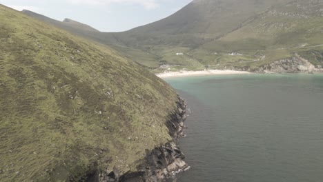Beautiful-Blue-Waters-And-White-Sand-In-A-Cove-In-Achill-Island---aerial-shot