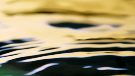 Water-surface-yellow-and-blue-texture-with-clean-ripples-and-wave-refraction-background