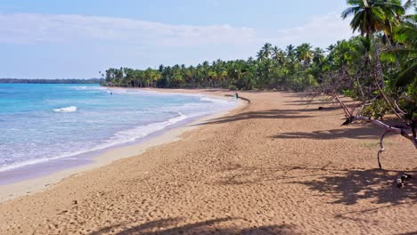 Fishermen-pulling-creels-ashore,-Coson-beach,-Las-Terrenas-in-Dominican-Republic
