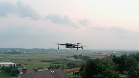 Close-up-aerial-flight-of-DJI-Mavic-2-Pro,-Hassleblad-4k-camera