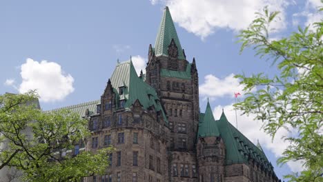 Confederation-Building-in-downtown-Ottawa,-Canada---4K-slow-motion-on-a-sunny-summer-day