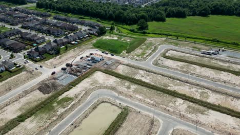 Aerial-construction-of-standalone-homes-foundations-in-new-subdivision