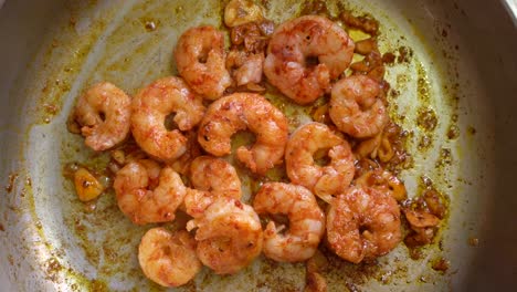 Peeled-Shrimps-With-Chopped-Garlic-And-Spanish-Paprika-Cooking-In-A-Pan-At-The-Kitchen