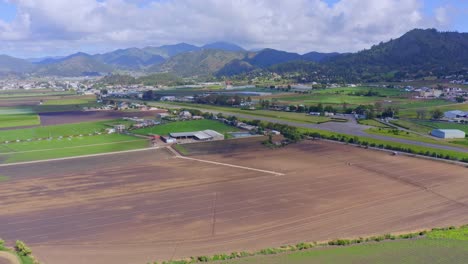 Aerial-drone-pov-over-farm-and-agricultural-production-in-Constanza-territory,-Dominican-Republic