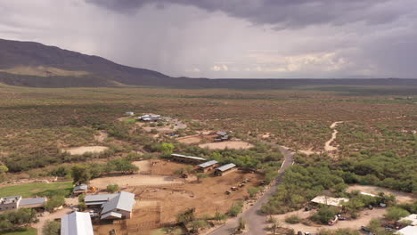 Tanque-Verde-Ranch-in-Tucson,-Arizona,-Aerial-View-of-beautiful-dude-ranch-with-horses-during-monsoon-season