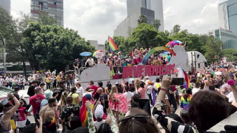 shot-video-of-people-participating-at-the-pride-parade-at-paseo-de-la-reforma-in-mexico-city-with-unicorn-truck-during-spring