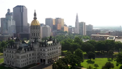 Connecticut-state-capitol-with-Hartford,-Connecticut-skyline-with-drone-video-moving-sideways
