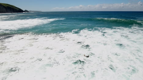 Cinematic-aerial-ocean-surfing-along-coast-of-South-Africa