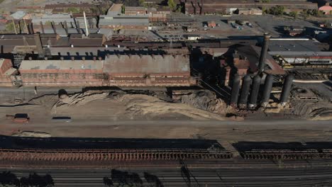 Aerial-panning-backward-from-an-old-steel-mill-slated-for-demolition