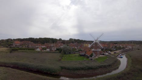 Aerial-drone-footage-of-Cley-Next-To-Sea,-and-the-surrounding-scenery,-Norfolk