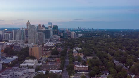 Drone-time-lapse-flying-north-in-Midtown-Atlanta-at-dusk