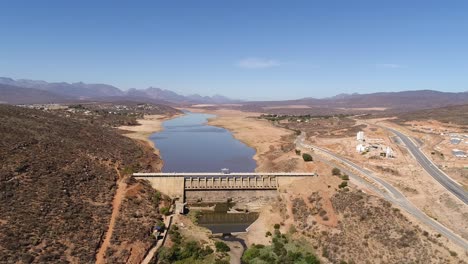 Aerial-footage-over-the-very-dry-Clanwilliam-dam,-in-the-Olifantsriver-in-the-drought-stricken-Western-Cape-of-South-Africa