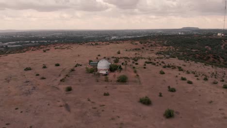 AERIAL-Shot-of-an-Observatory-on-a-Overcast-Day
