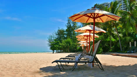 Umbrella-and-chair-on-the-beach-and-sea-landscape-for-travel