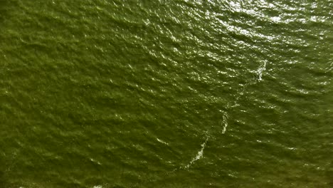 AERIAL:-Still-shot-of-Baltic-Sea-with-waves-rippling-through-the-surface-of-water
