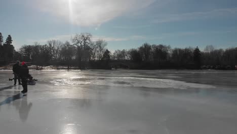 ice-fishers-on-a-frozen-lake-afternoon
