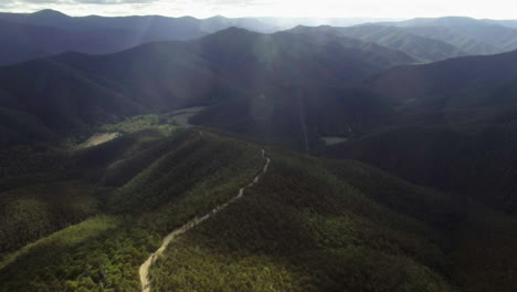 Dramatic-aerial-shot-flying-towards-the-mountains-of-the-Victorian-High-Country,-Australia