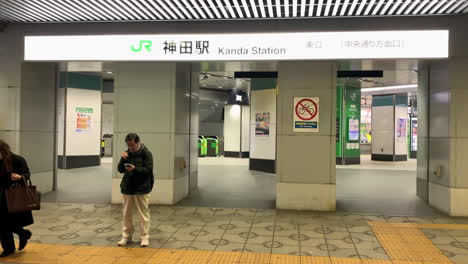 The-facade-of-East-gate-of-Kanda-Station-with-people-come-in
